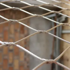 Сетка нержавеющая тросовая с узловым креплением и ромбической ячейкой Н1 7х7 AISI 304 20х35х1 мм